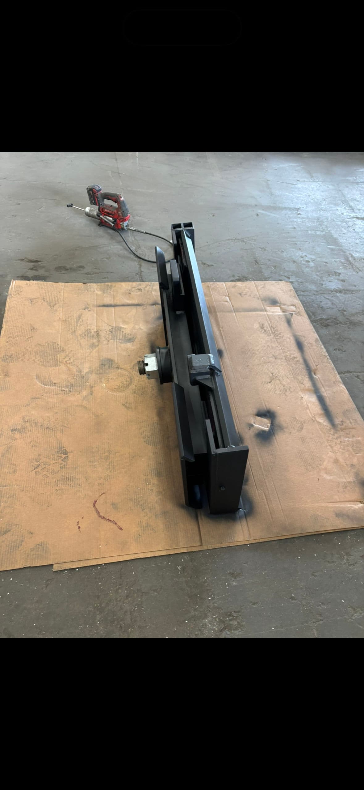 Gallery photos for Custom Tilt Plate Fabricated for a Skid Loader: Image #1