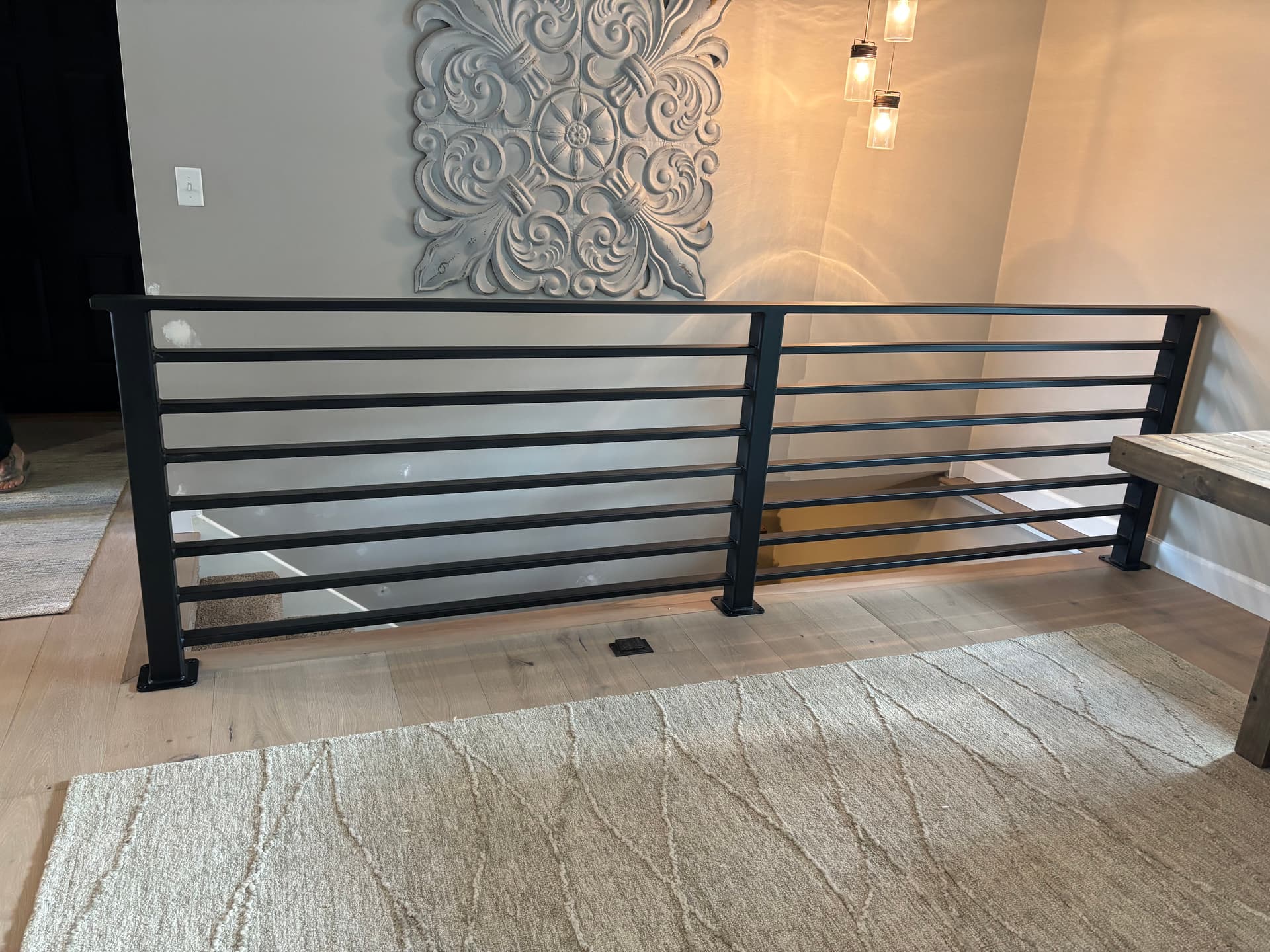 Modern Horizontal Metal Railing Installed in Northfield Home image